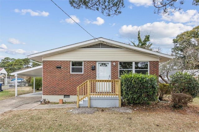 bungalow-style home featuring a carport