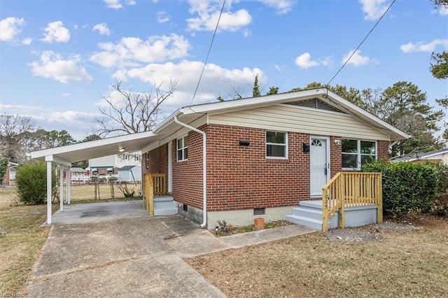 view of front of property with a carport