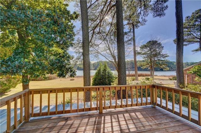 deck featuring a water view