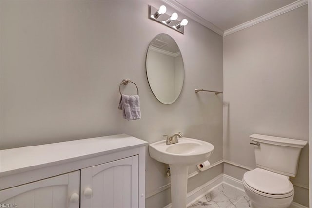 bathroom with toilet and ornamental molding