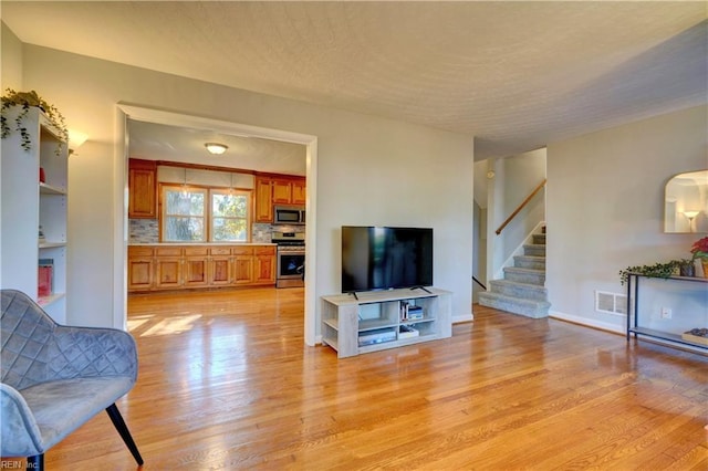 living room featuring light hardwood / wood-style flooring