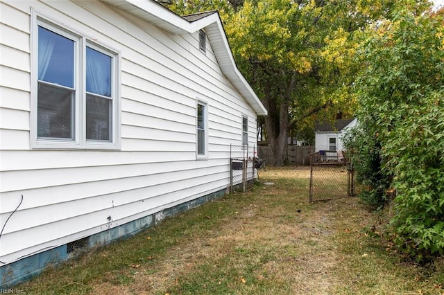 view of home's exterior featuring a lawn