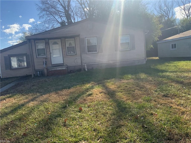 view of front of home with a front yard