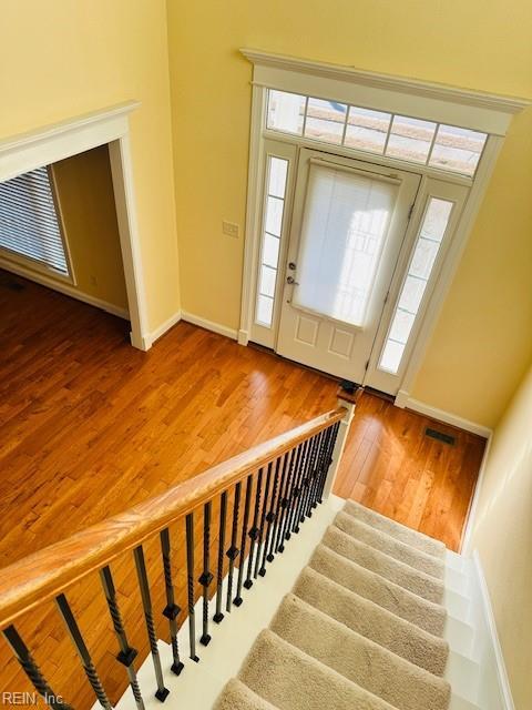 entrance foyer with hardwood / wood-style floors