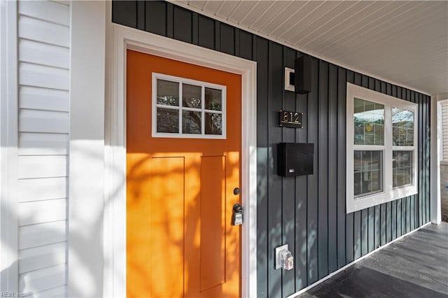 property entrance with covered porch