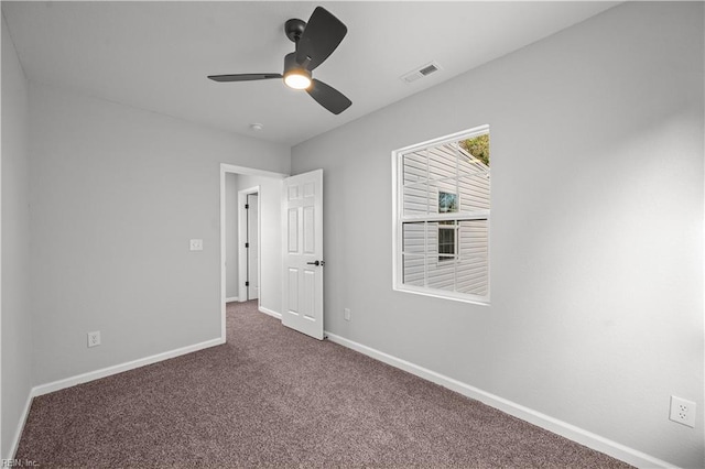 unfurnished bedroom with carpet flooring and ceiling fan