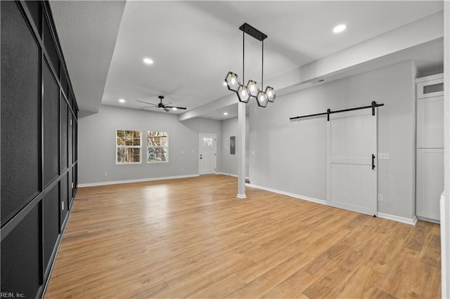 interior space featuring ceiling fan