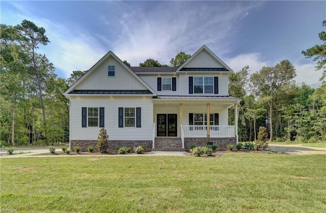 craftsman-style house with a front lawn and a porch