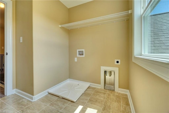 clothes washing area featuring washer hookup and hookup for an electric dryer