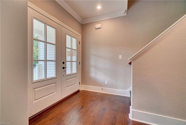 doorway to outside featuring french doors, crown molding, and dark wood-type flooring