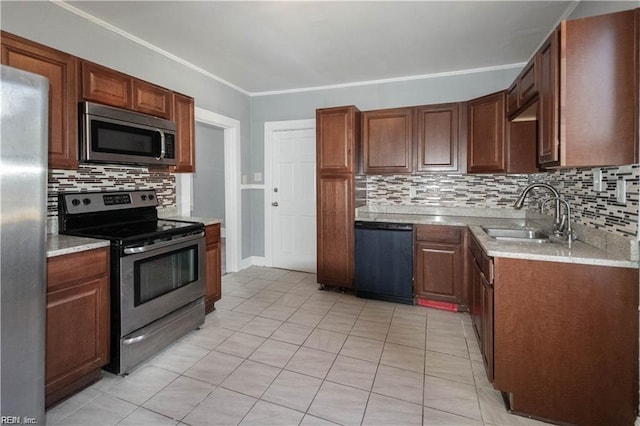 kitchen featuring appliances with stainless steel finishes, backsplash, crown molding, sink, and light tile patterned floors