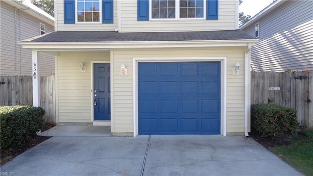 entrance to property featuring a garage