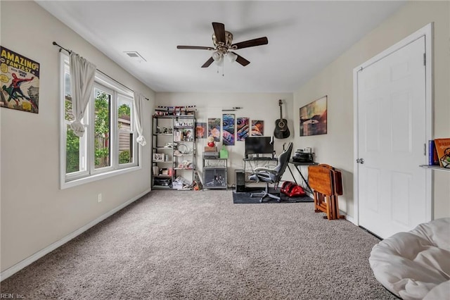 interior space featuring ceiling fan and carpet floors