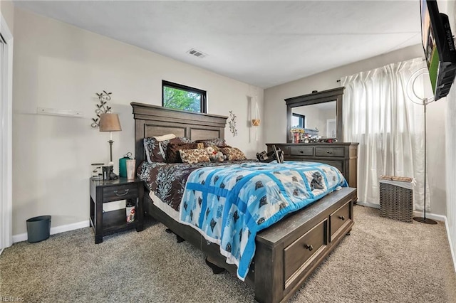 bedroom with light colored carpet