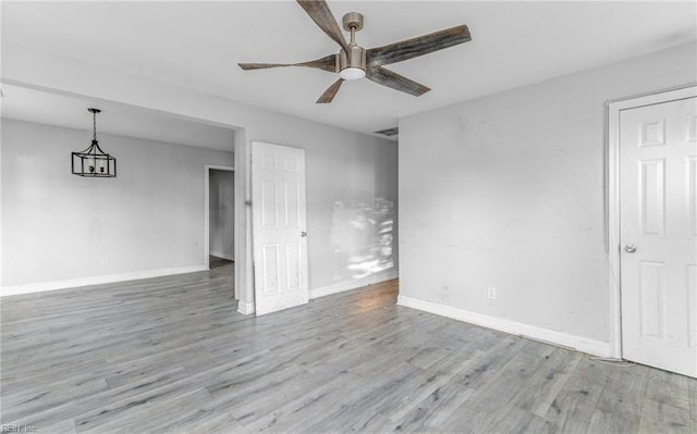 unfurnished room featuring ceiling fan and light hardwood / wood-style floors