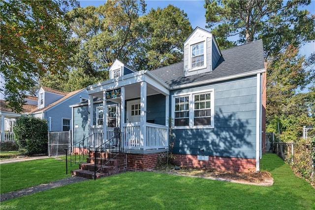 view of front of property featuring a front lawn and a porch