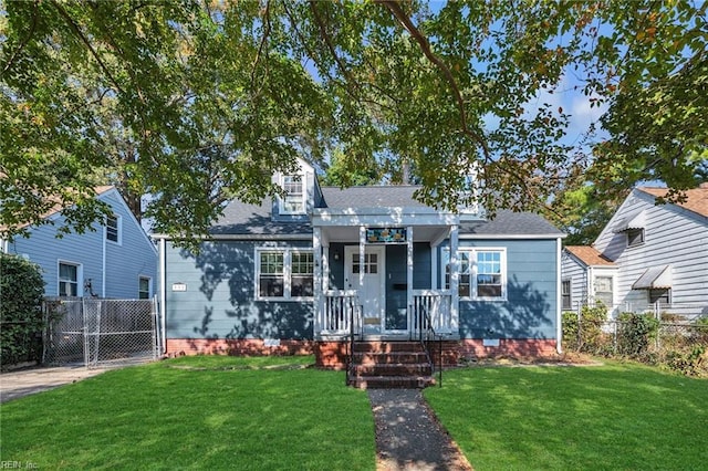 view of front of home with a front yard