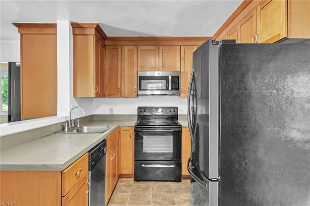 kitchen with sink and stainless steel appliances