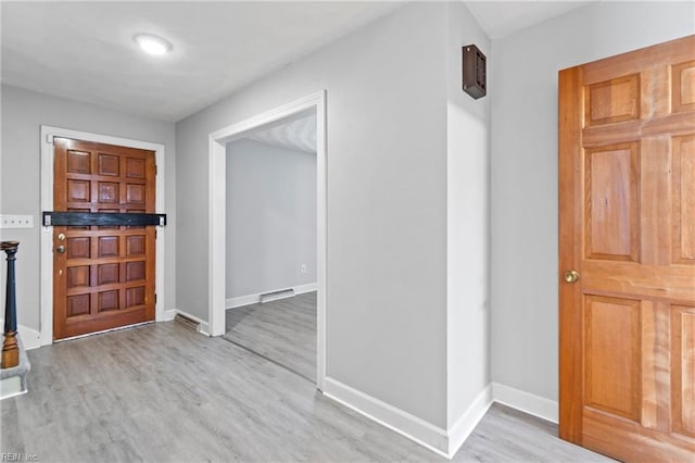 hallway featuring light wood-type flooring