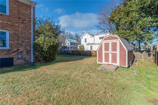 view of yard with a storage shed