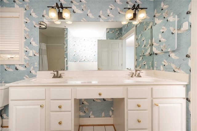 bathroom featuring toilet, vanity, tile patterned floors, and walk in shower