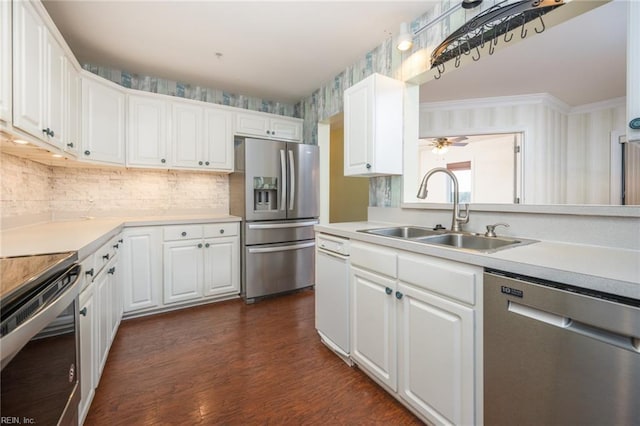 kitchen featuring white cabinetry, sink, ceiling fan, and stainless steel appliances