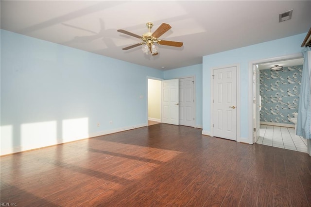 interior space featuring ceiling fan and dark wood-type flooring