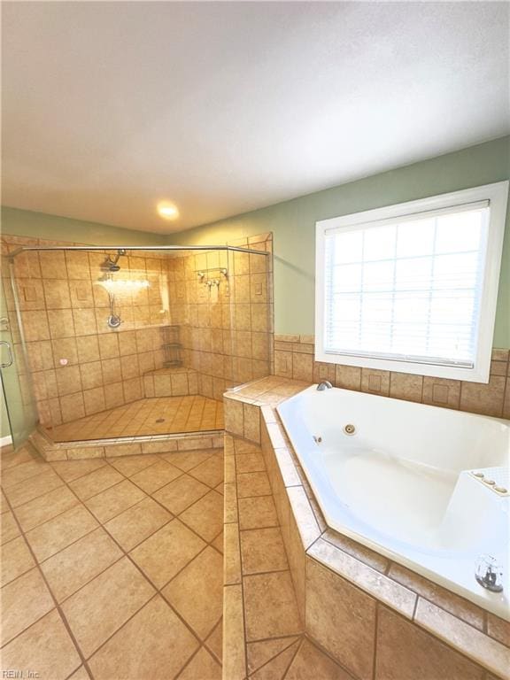 bathroom featuring independent shower and bath and tile patterned floors