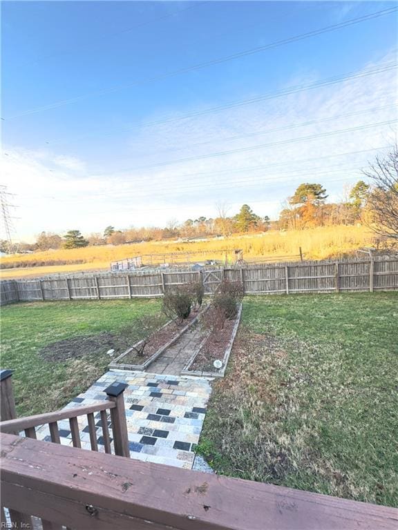 view of yard featuring a patio area and a rural view