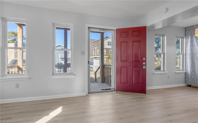 entrance foyer featuring light hardwood / wood-style floors