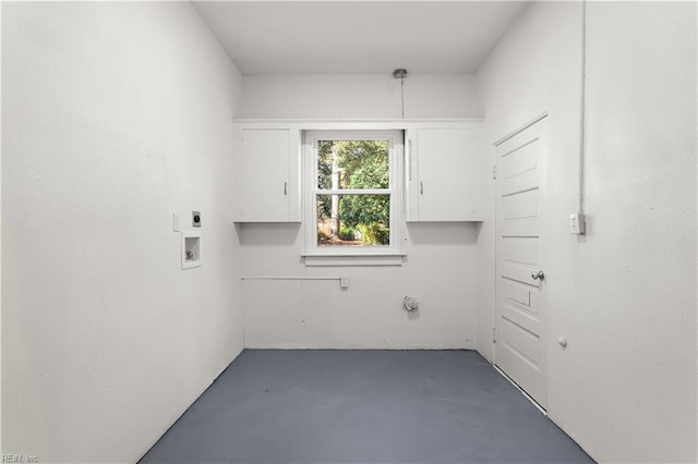 clothes washing area featuring hookup for an electric dryer, hookup for a washing machine, and hookup for a gas dryer