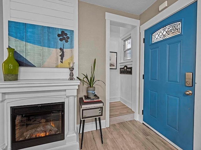 entrance foyer with light hardwood / wood-style floors