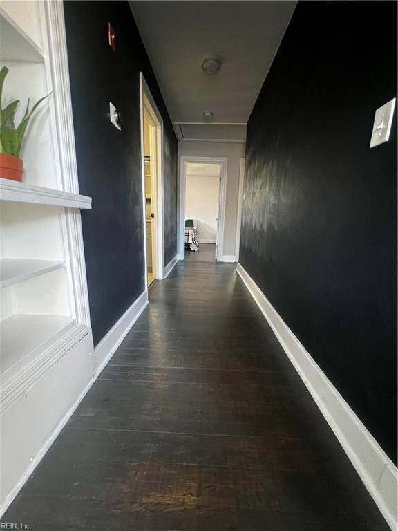 hall featuring dark hardwood / wood-style floors