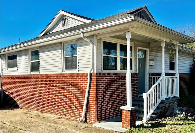 view of home's exterior featuring a porch