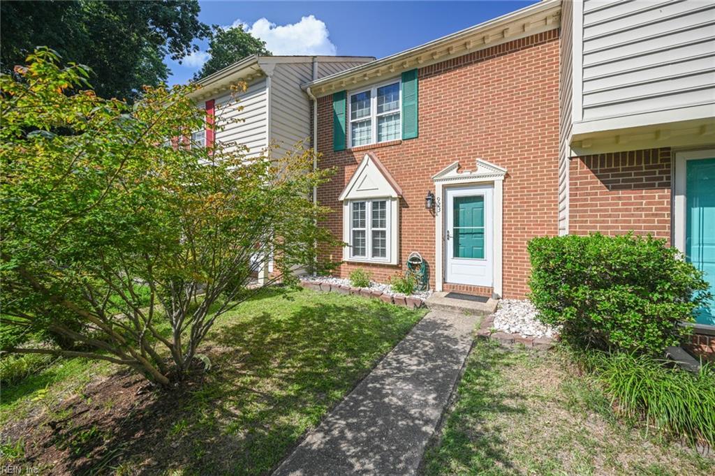 view of property with a front lawn