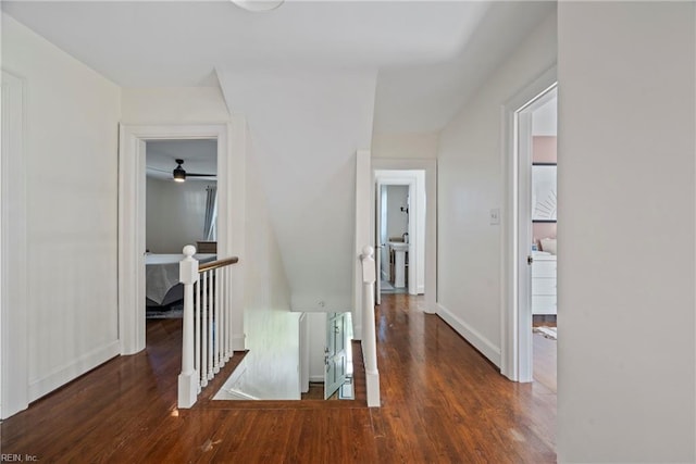 hall with dark hardwood / wood-style flooring