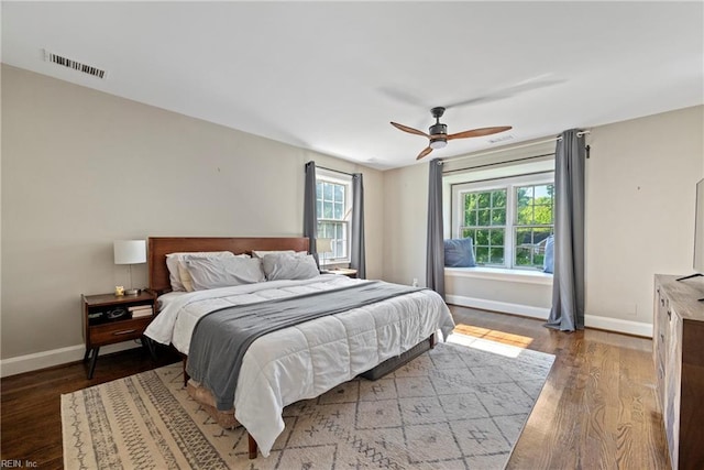 bedroom featuring ceiling fan and wood-type flooring