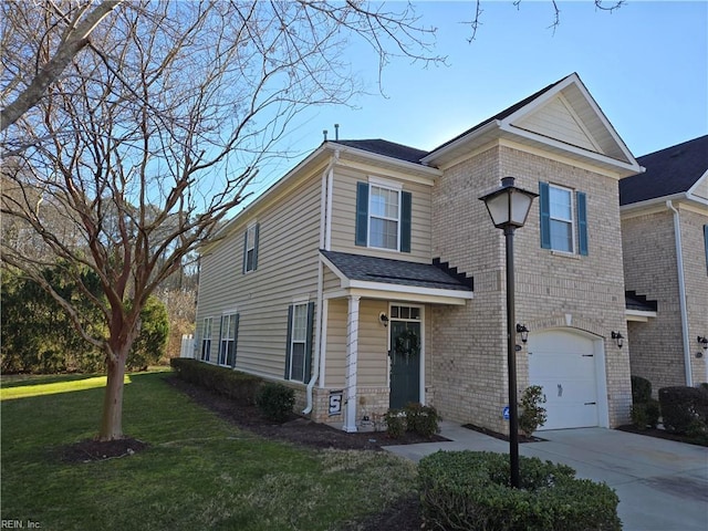 view of front of home with a garage and a front yard