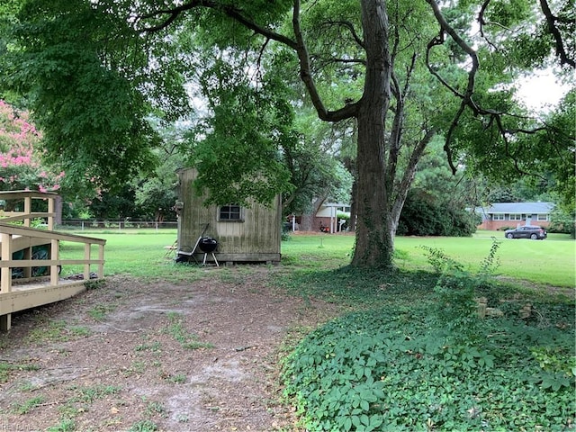 view of yard with a deck