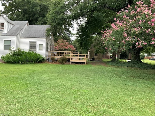 view of yard featuring a deck