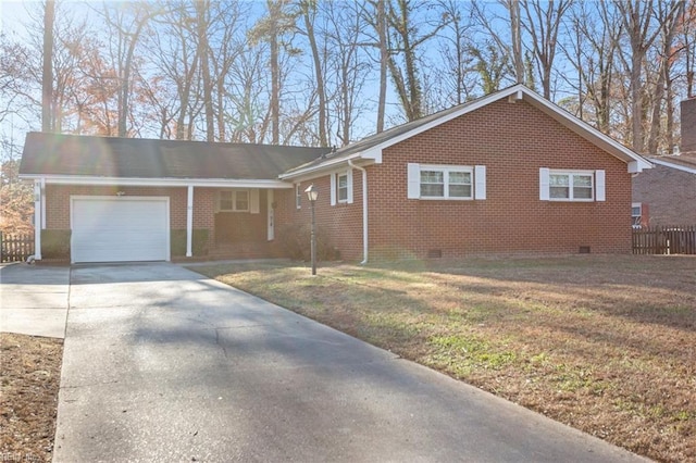 single story home with a front yard and a garage