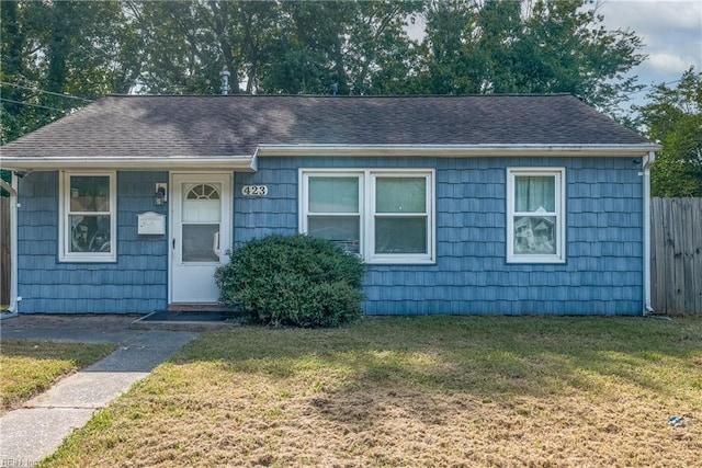 view of front of home with a front lawn