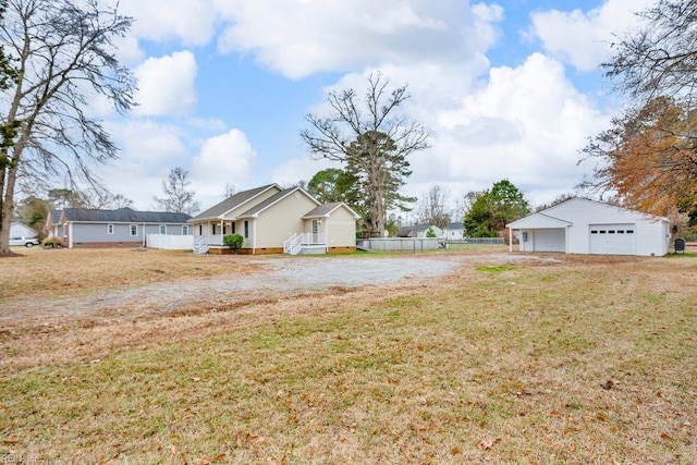 view of yard with an outbuilding and a garage