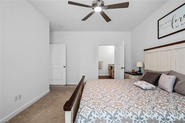 bedroom with ceiling fan and light carpet