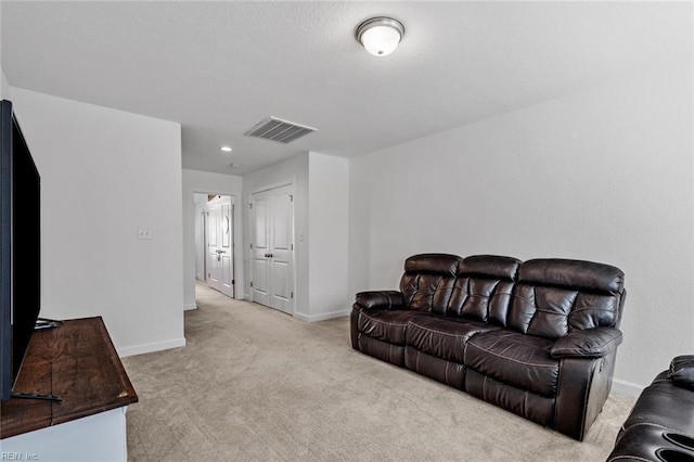 living room with light colored carpet