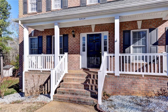 property entrance featuring covered porch