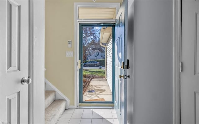 entrance foyer with light tile patterned floors