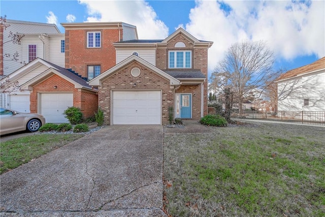 view of front of property with a garage and a front lawn