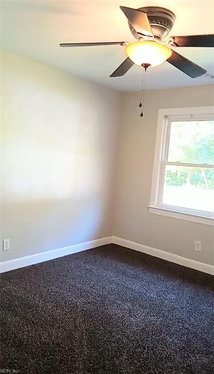 unfurnished room featuring ceiling fan