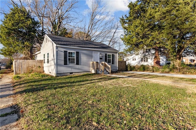 view of front of home featuring a front lawn